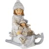Decoración niño en trineo blanco 10x5x10 cm 6PR4665
