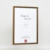 Efecto marco de madera maciza perfil 22 marrón-oro 35x50 cm cristal antirreflejo