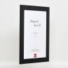 Efecto marco de madera maciza perfil 30 negro 25x50 cm cristal antirreflejos