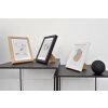Marco de madera Nielsen Skava negro 29,x7x42 cm con passepartout 21x29,7 cm