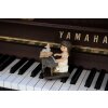 Clayre & Eef 6PR5029 Niño con piano figurita decorativa 10x6x10 cm Marrón
