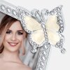 Marco de fotos ZEP Ives plata brillante con decoración de mariposa 10x15 cm